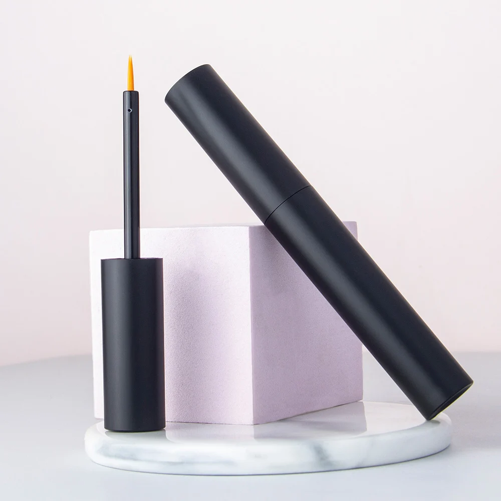 Matte black empty liquid eyeliner tube with fine tip brush applicator, cosmetic packaging for private label makeup